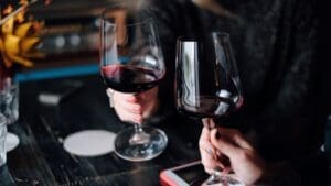 WSA Bangkok Wine tour participants toasting red wine in a french restaurant
