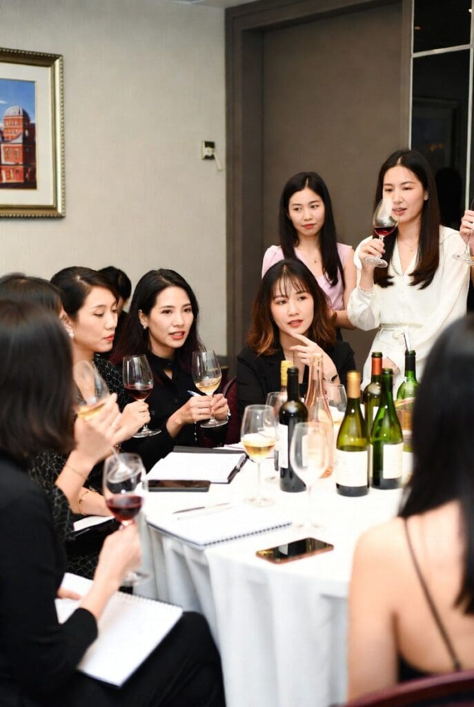 women learning social wine manners and etiquette workshop bangkok