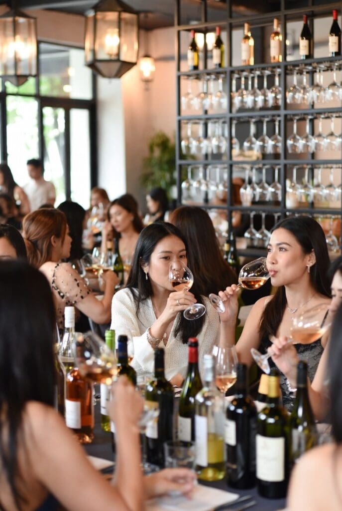 ladies only wine tasting class bangkok women enjoying wine elegantly