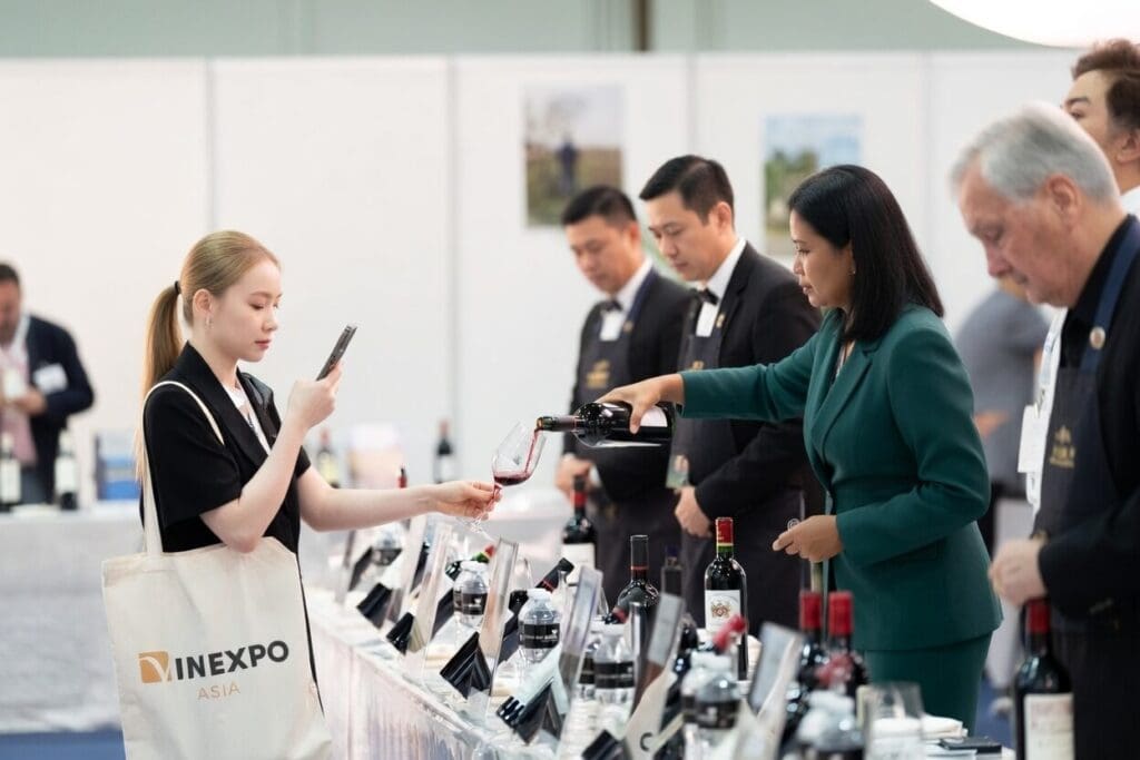 professional sommelier serving wine at corporate event in Hong-Kong