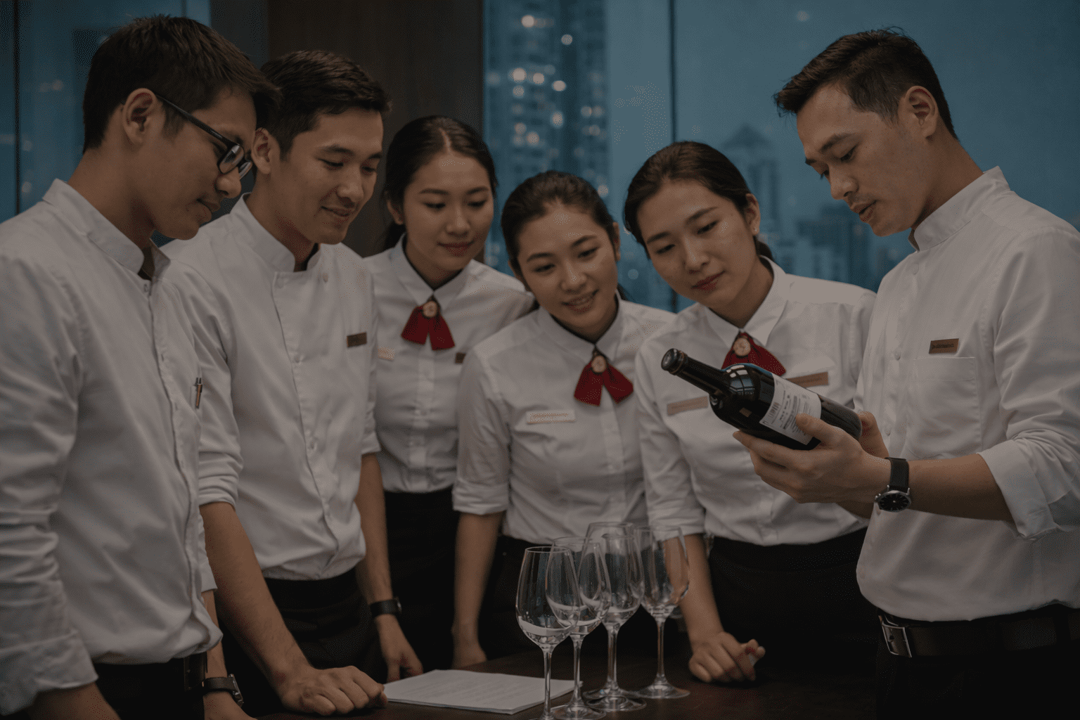 Professional wine service training during HORECA Sommelier Course Bangkok at Wine & Spirit Academy